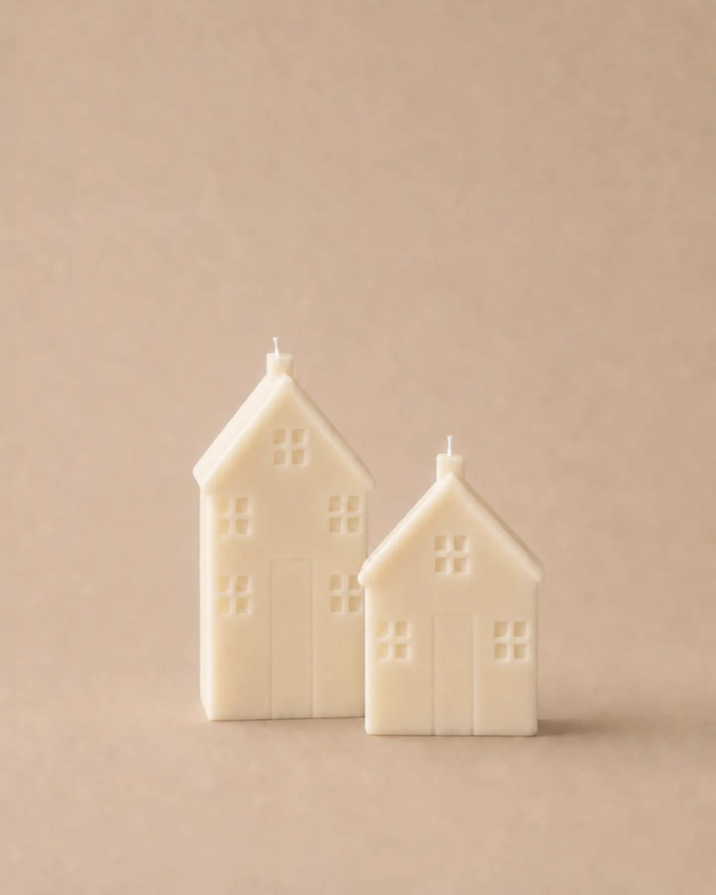 The Haven, a tall and a small house candle